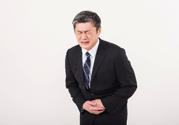 便秘で悩む男性